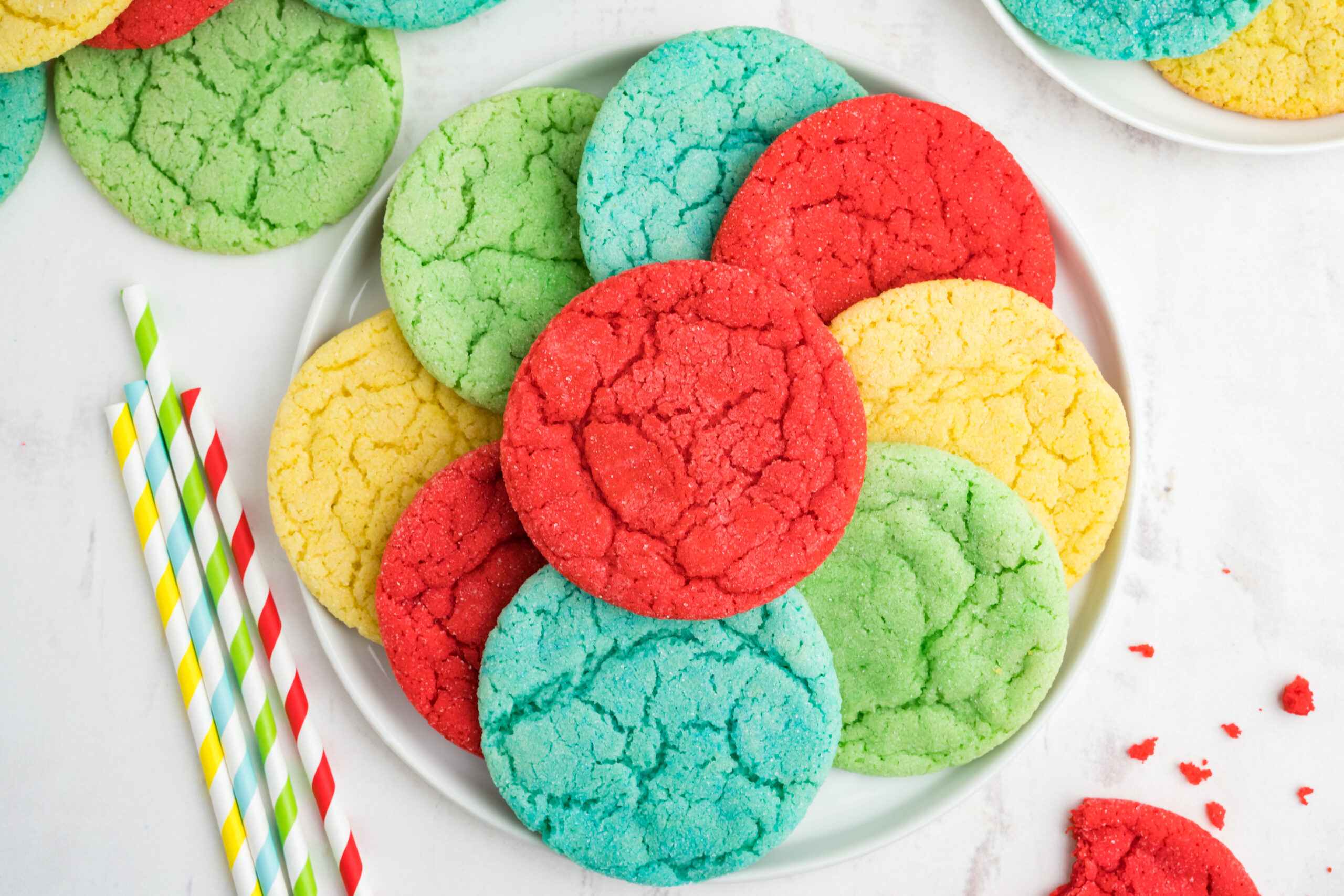 Overhead view of Jello Cookies on a white plate.