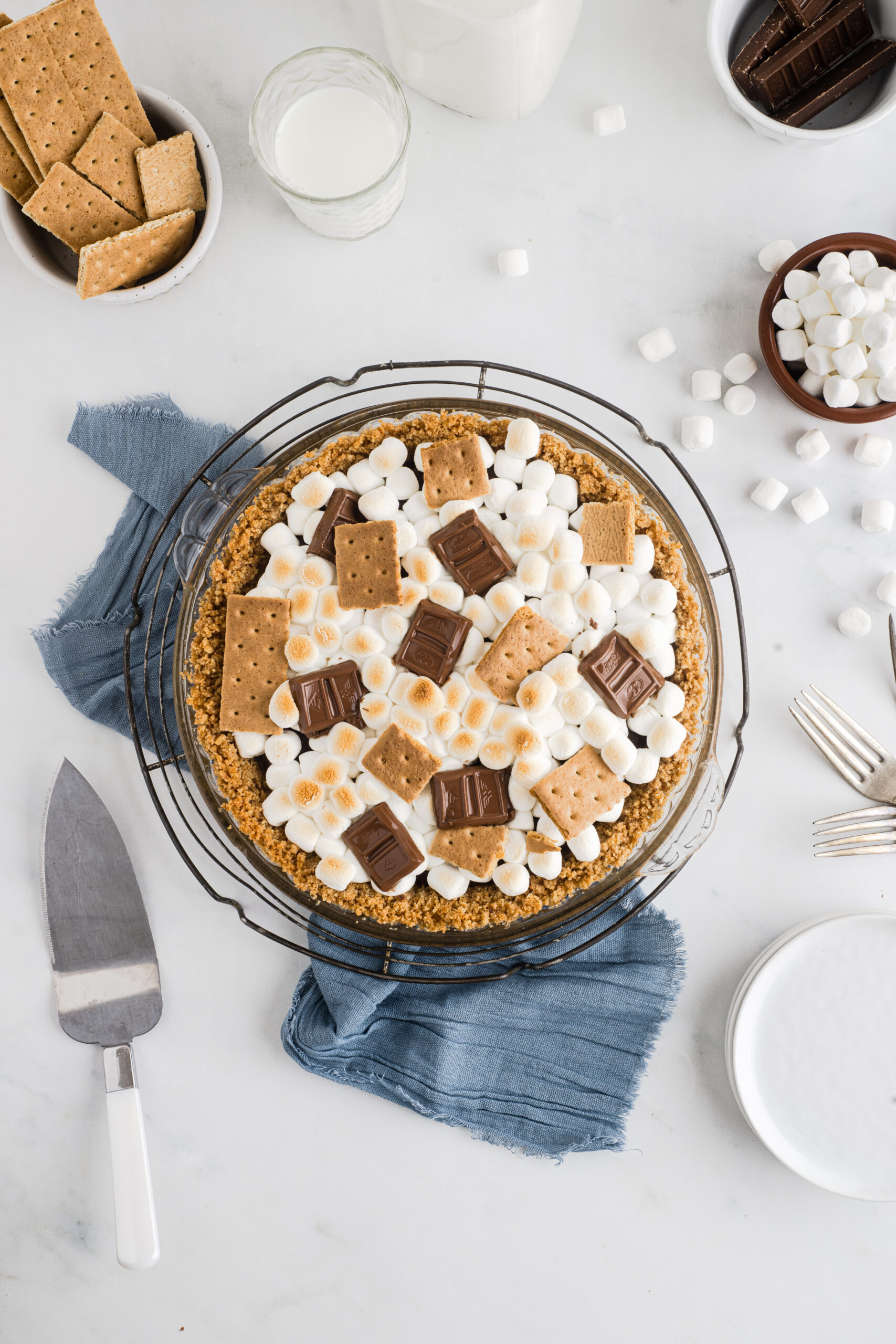 Overhead view of the S'mores Pie on a metal wire rack. 