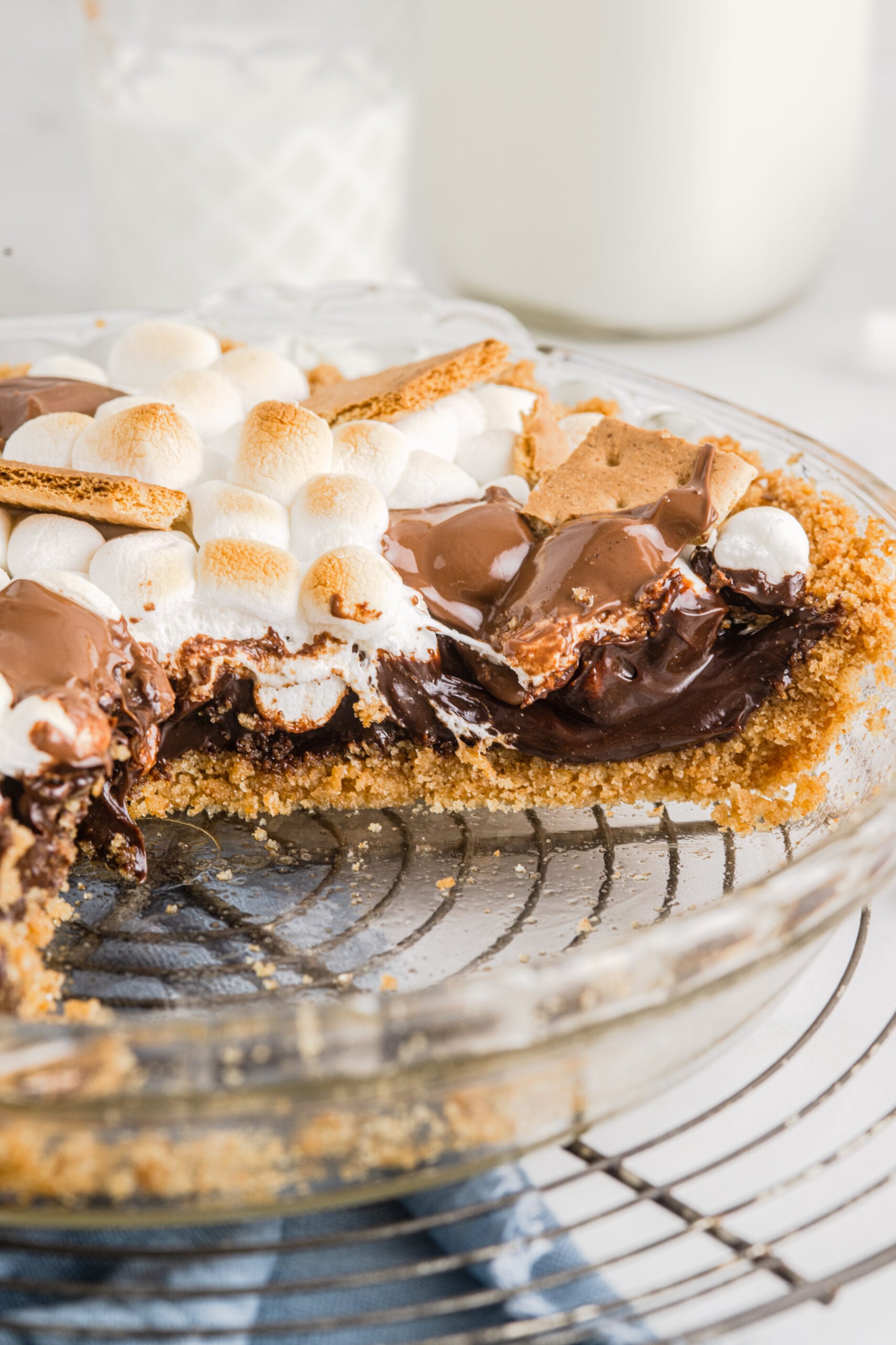 Close up view of a cut piece of S'mores Pie showing the different layers. 