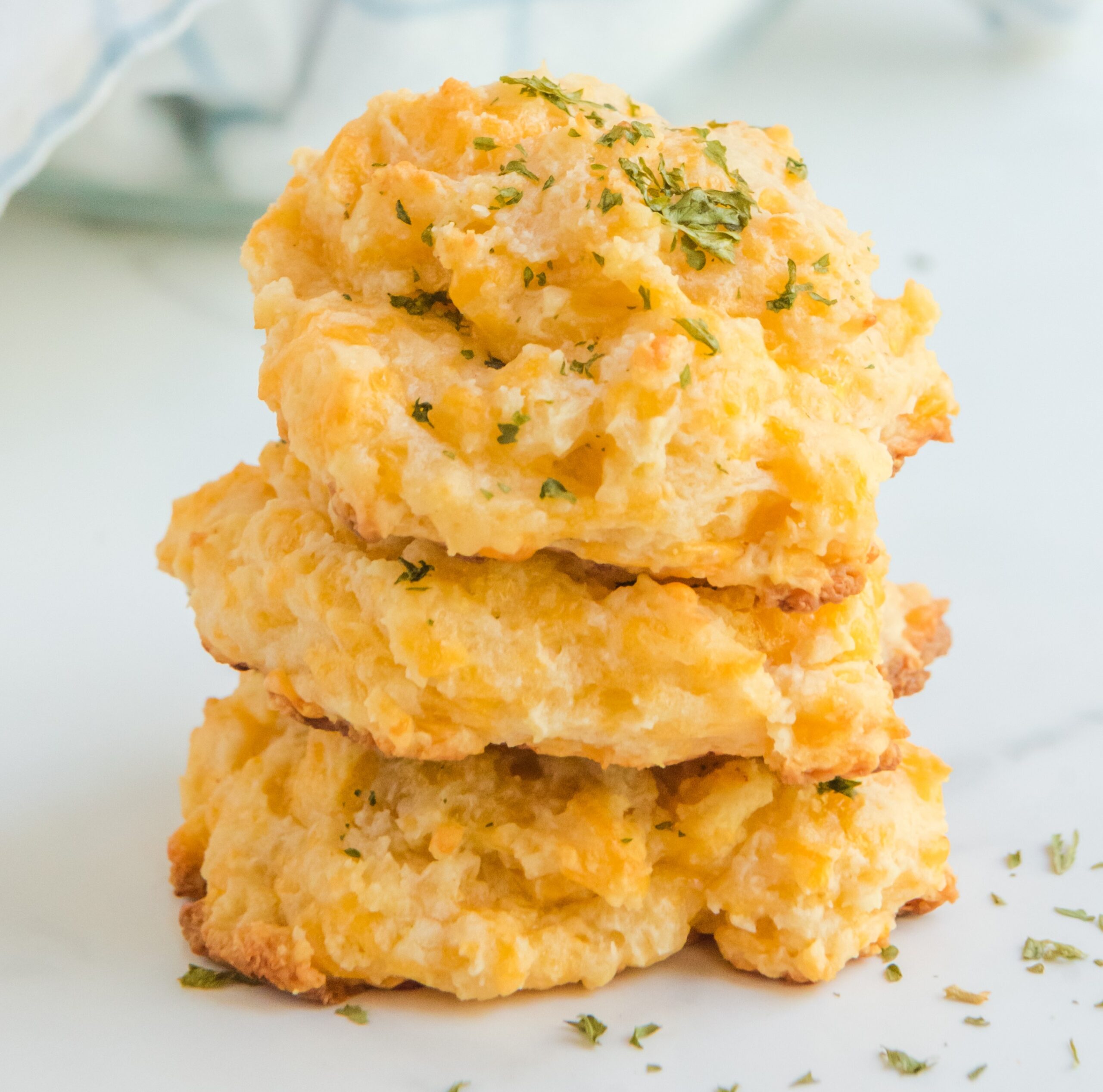 a stack of 3 cheddar bay biscuits