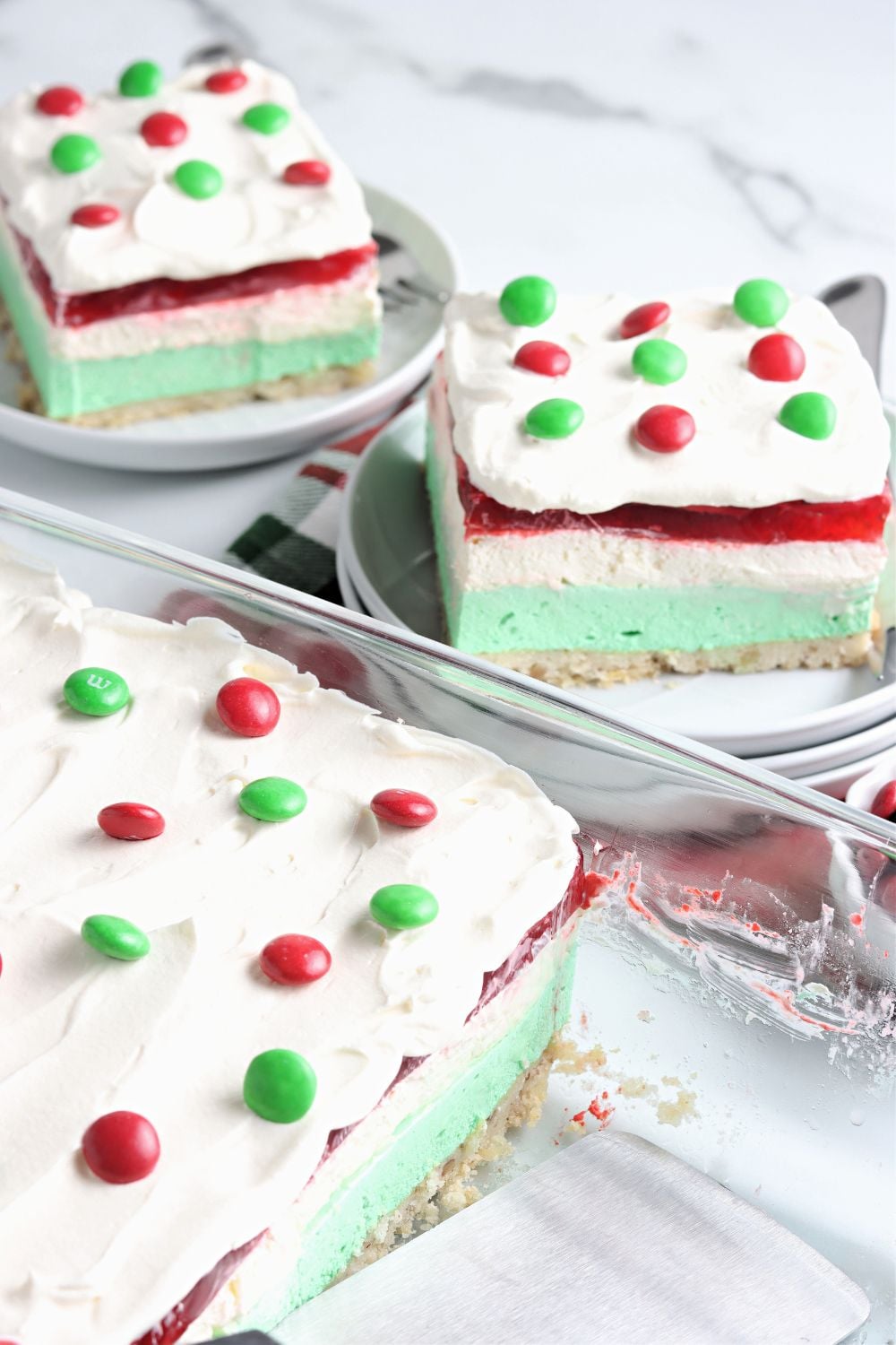 pan with lasagna that is a layered Christmas dessert in pan