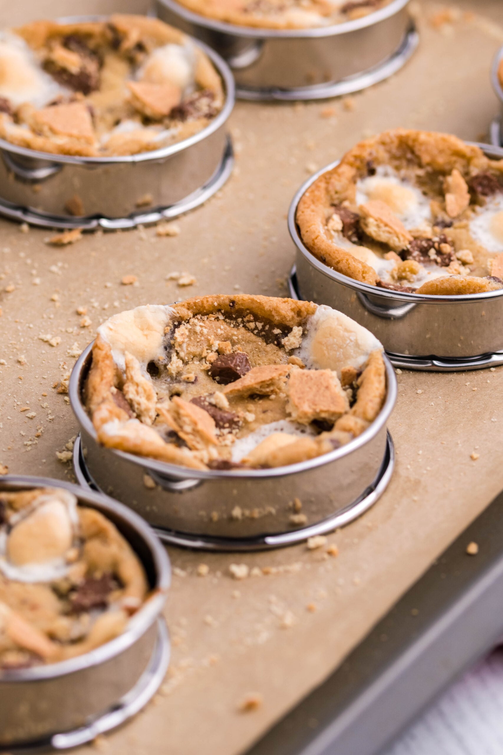 S'mores cookies inside the deep dish stainless steel pan being baked