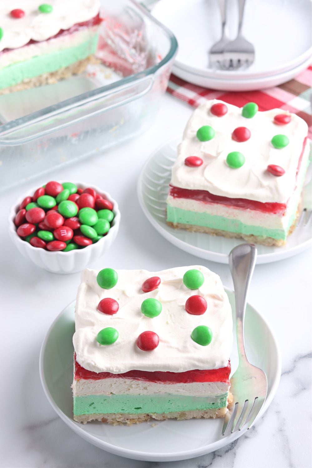 plates on table with jello dessert on it for Christmas