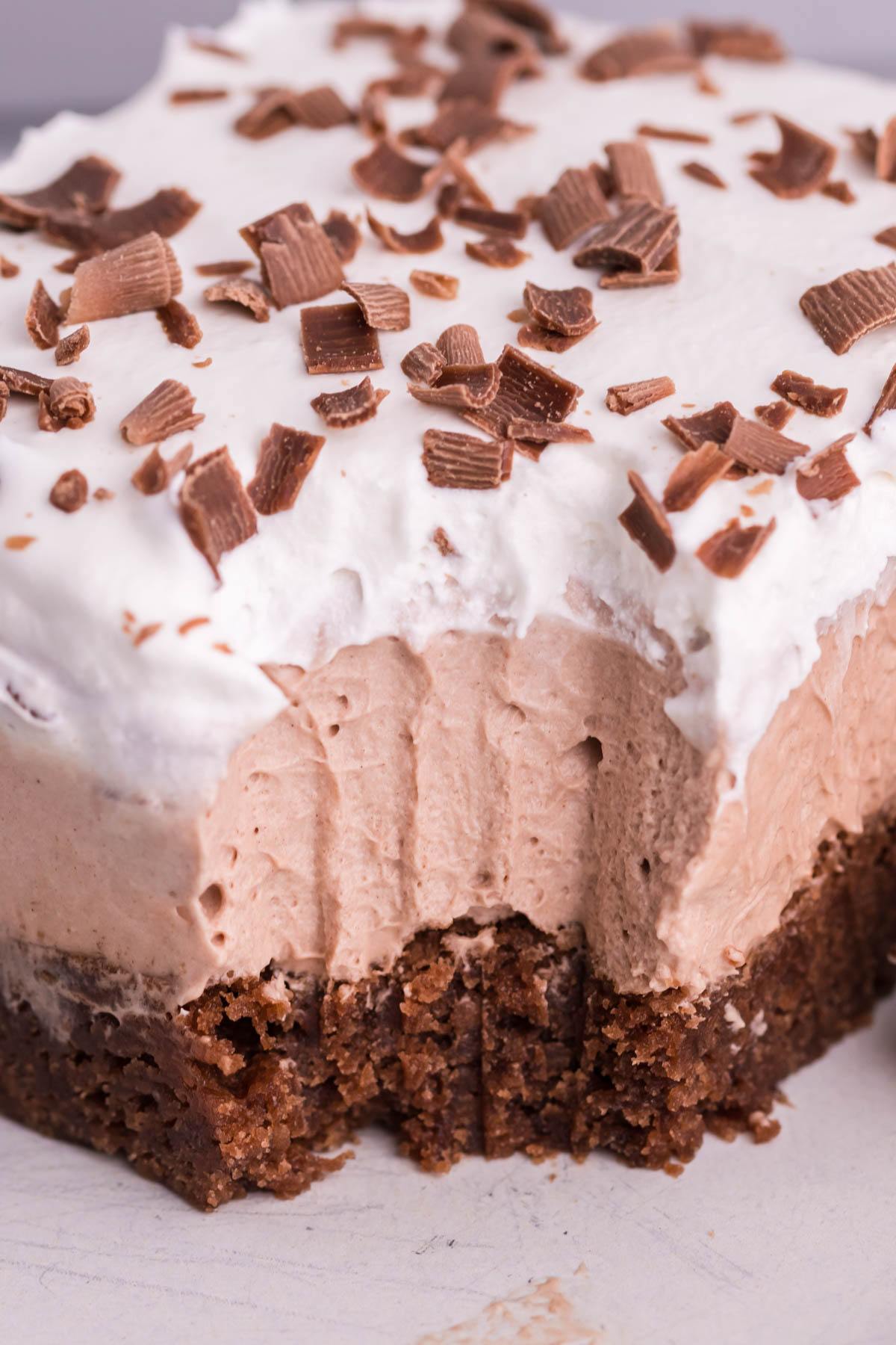 up close shot of the french silk brownies with a bite missing