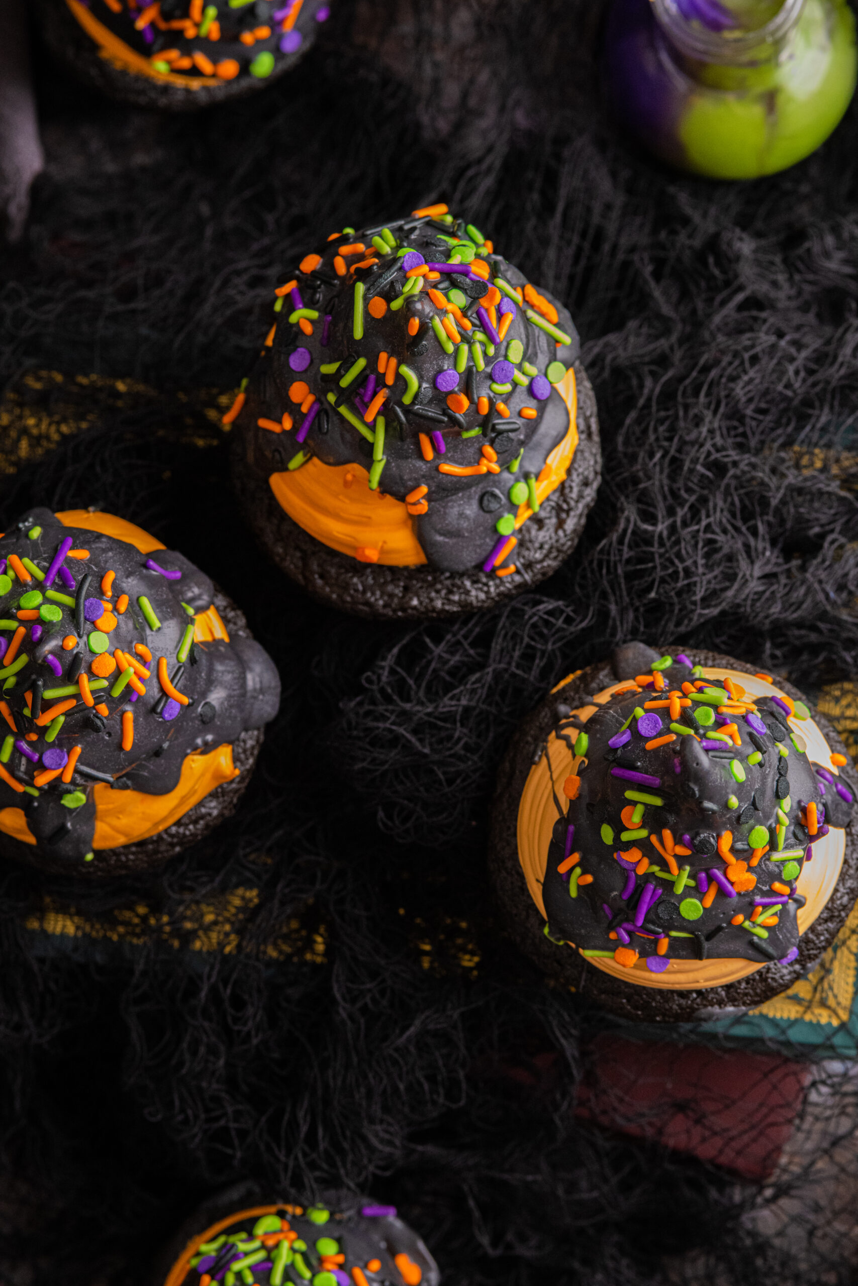 Halloween cupcakes on table with overhead shot to see the frosting on each cupcake