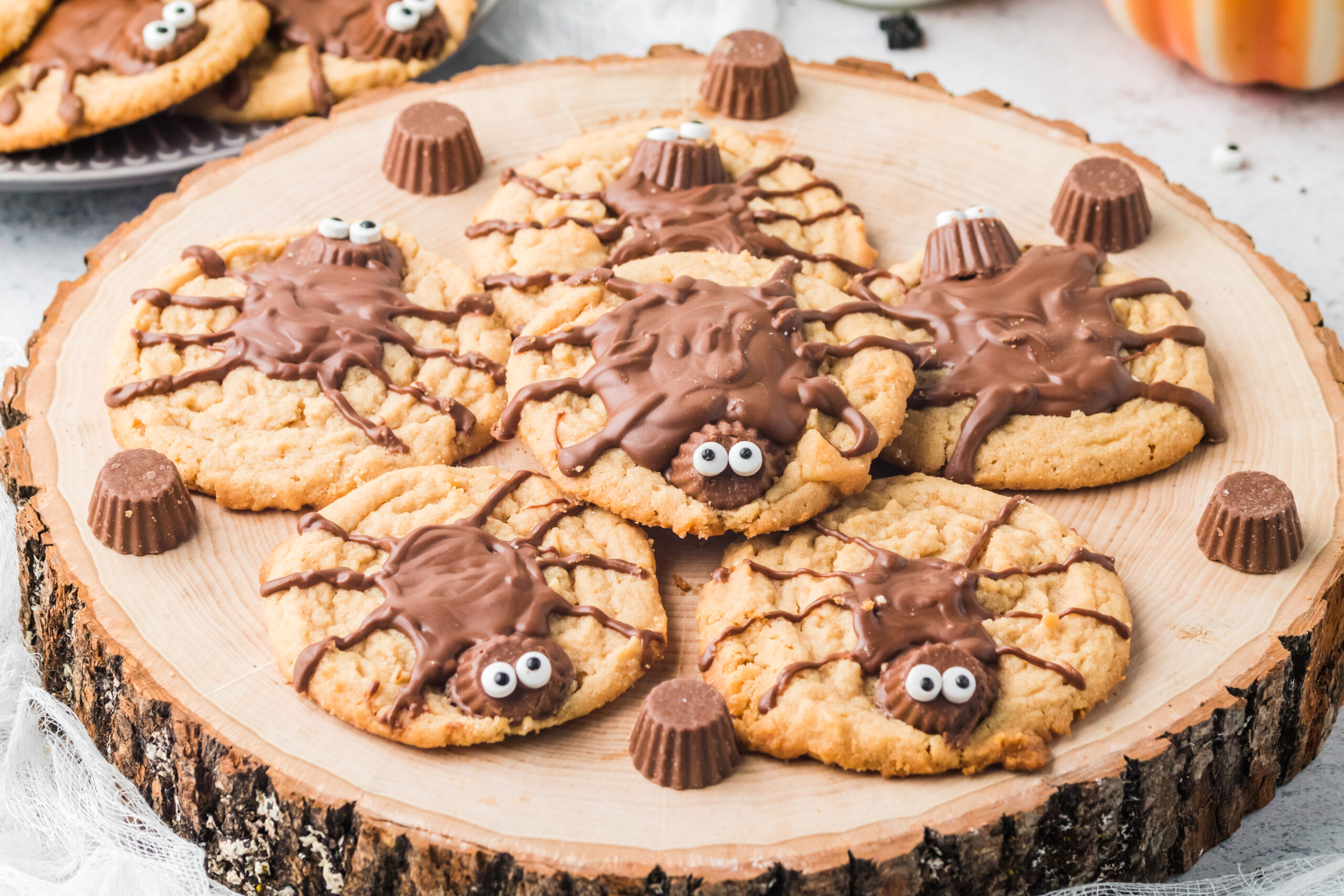 Peanut Butter Spider Cookies on a wood round table