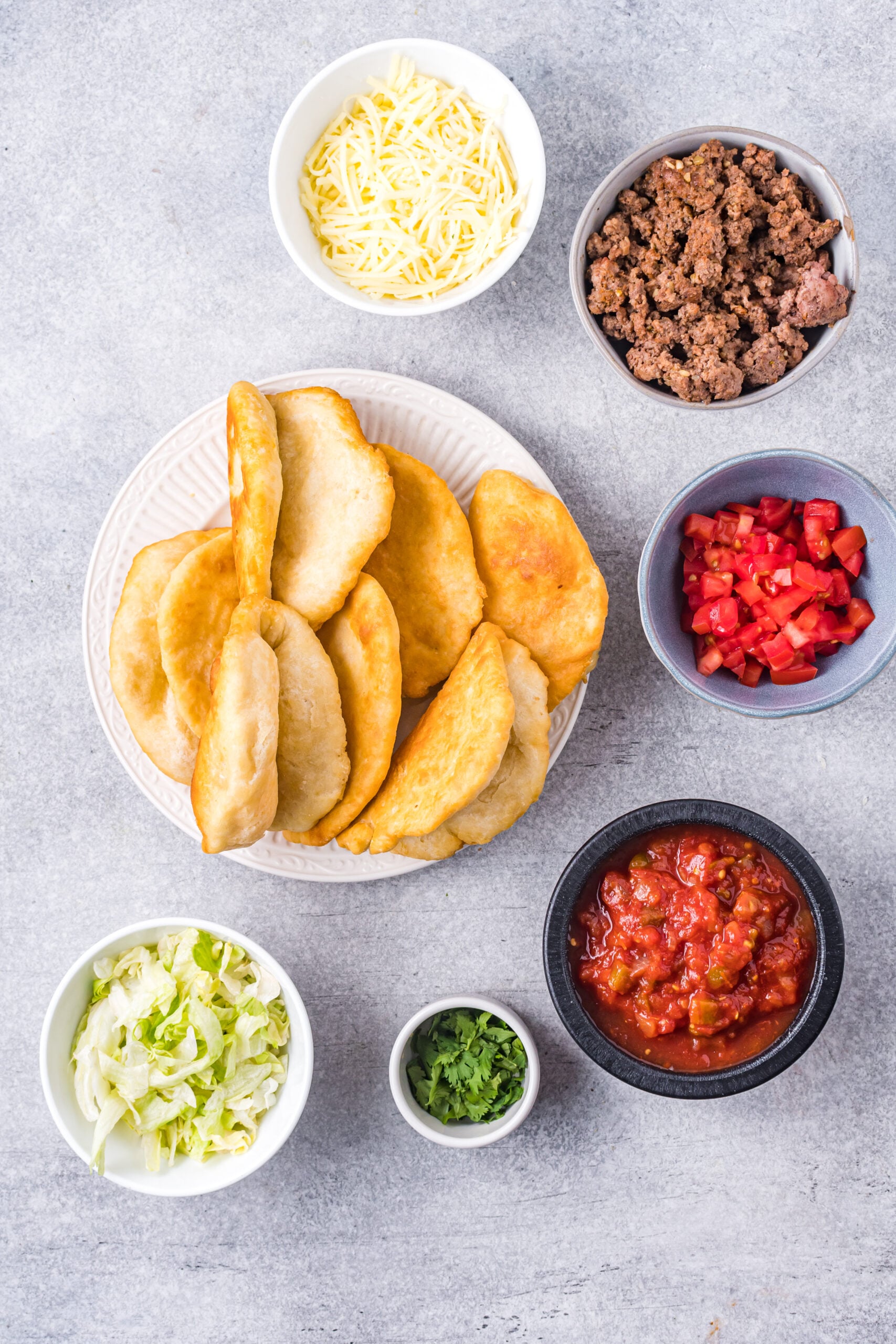 Taco Bell Chalupa ingredients in small bowls
