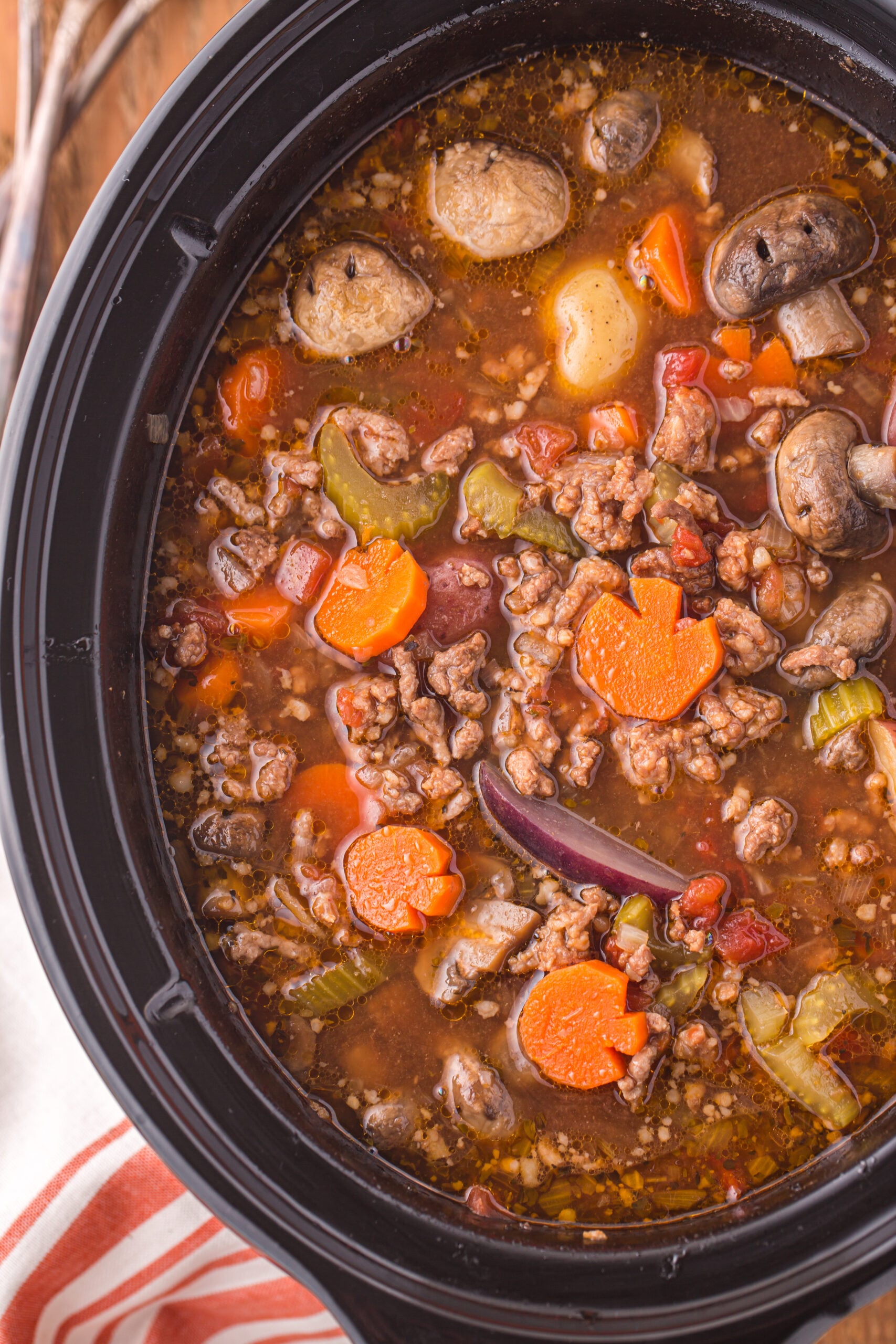 Overhead view close up of Witches Brew Stew in a slow cooker.