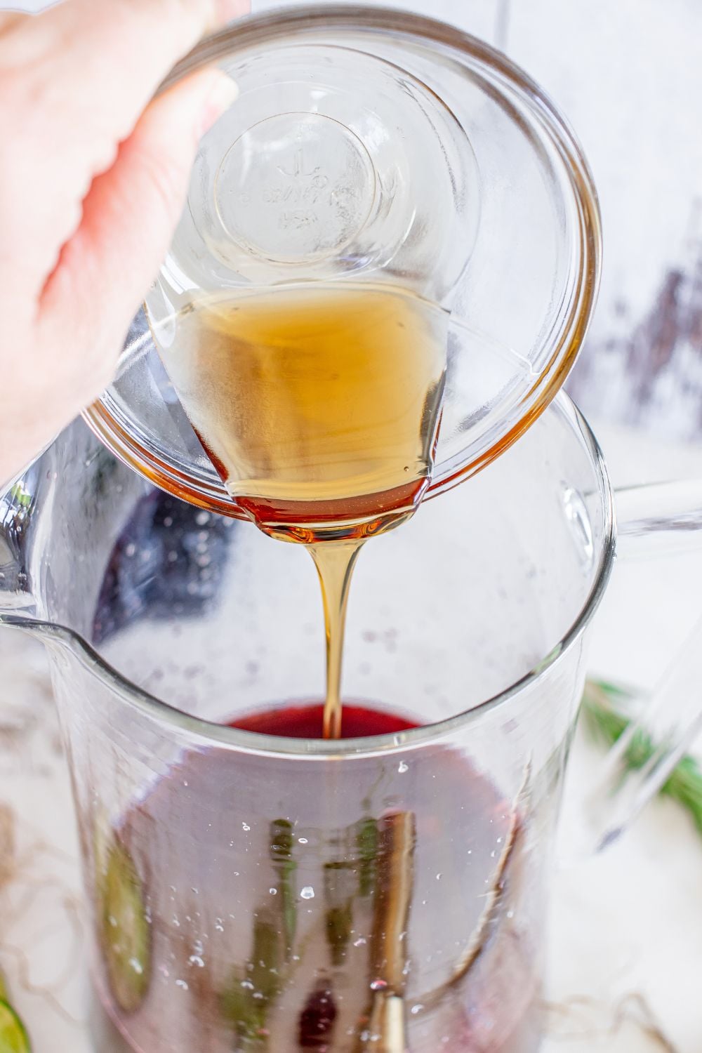 agave nectar pouring into a glass