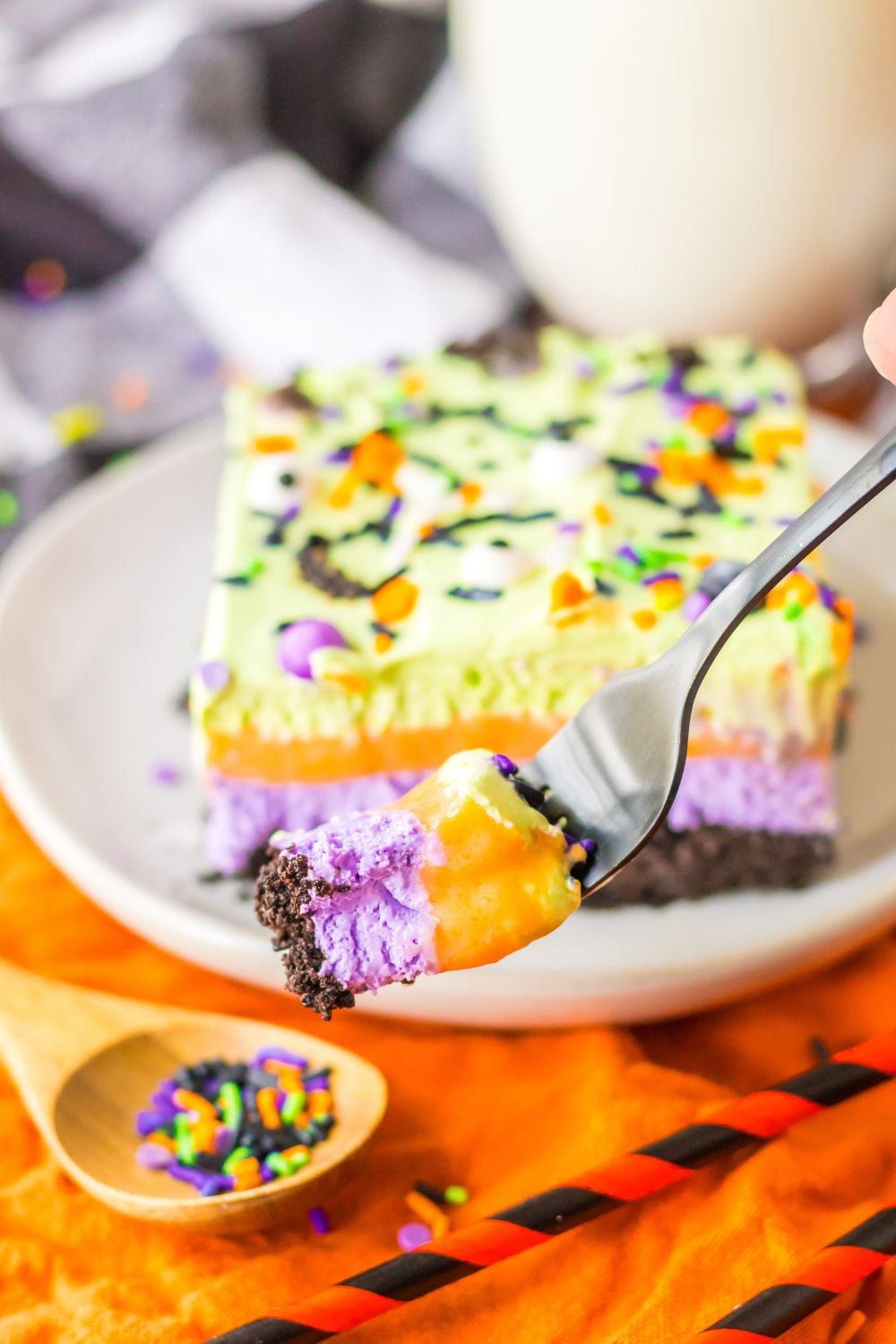 sliced cake on plate with fork bite