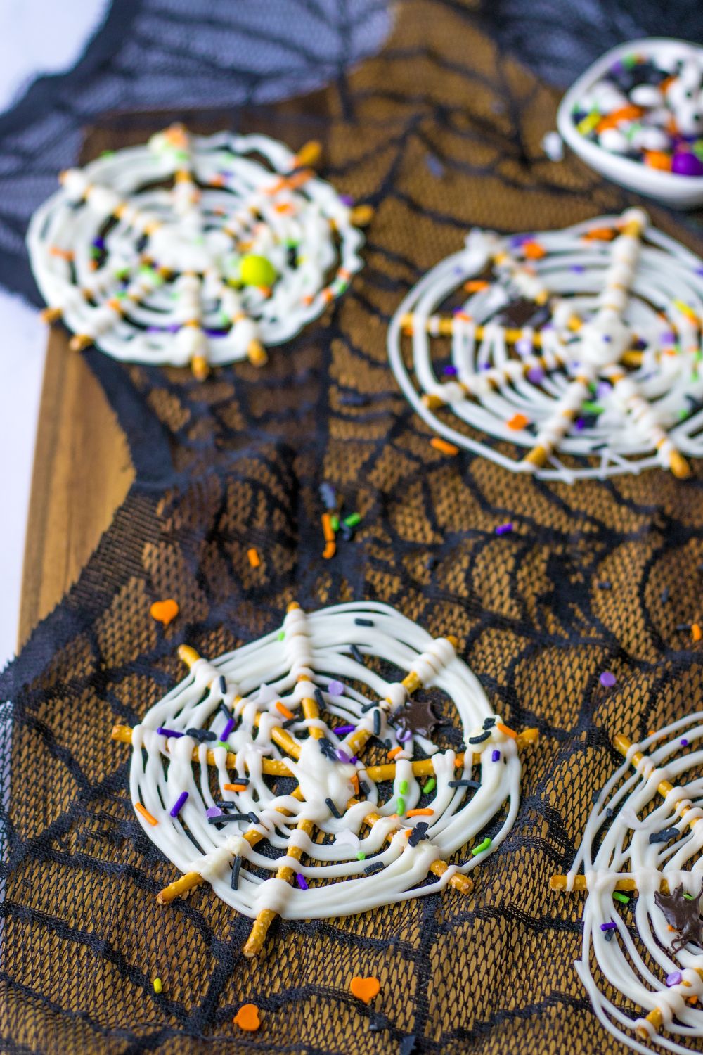 halloween pretzels on table scattered around