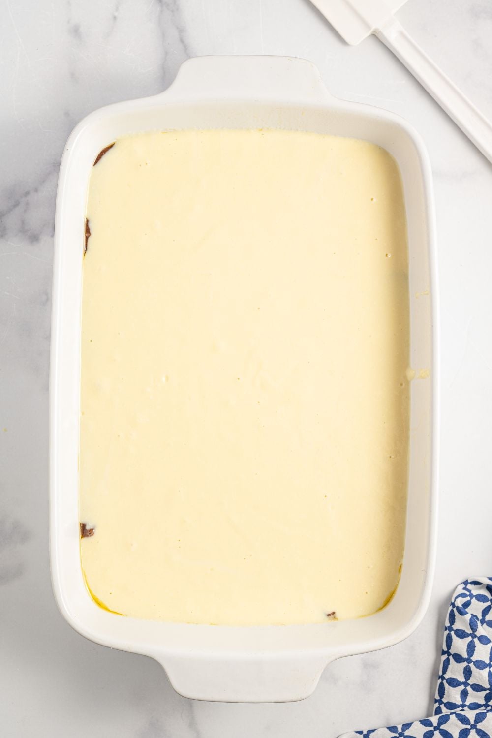 ricotta batter in a 9x13 baking dish 