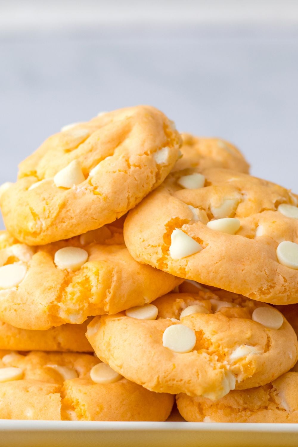 stacked cookies on a white plate