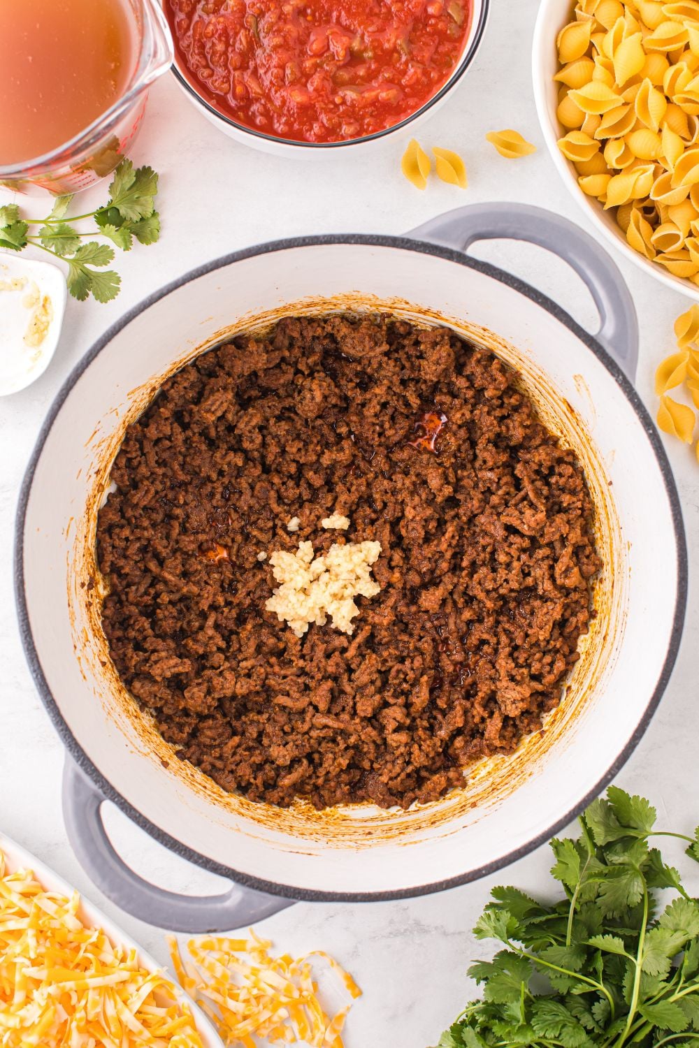 cooked ground beef with seasoning in pot