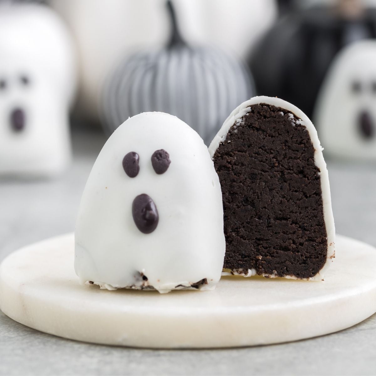 sliced Halloween Oreo truffle on marble platter