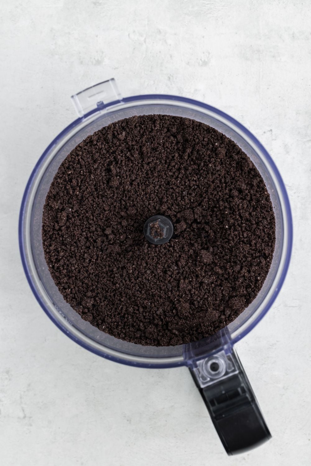crushed Oreo cookies in a food processor