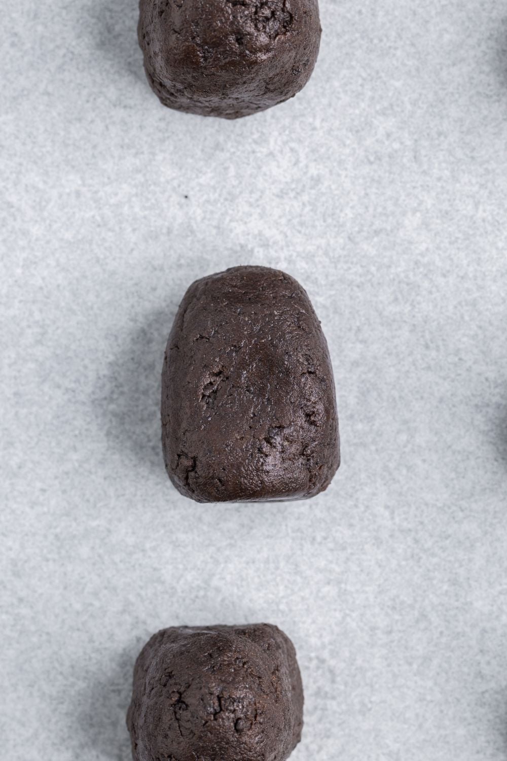 Oreo truffling mixture shaped into a bell