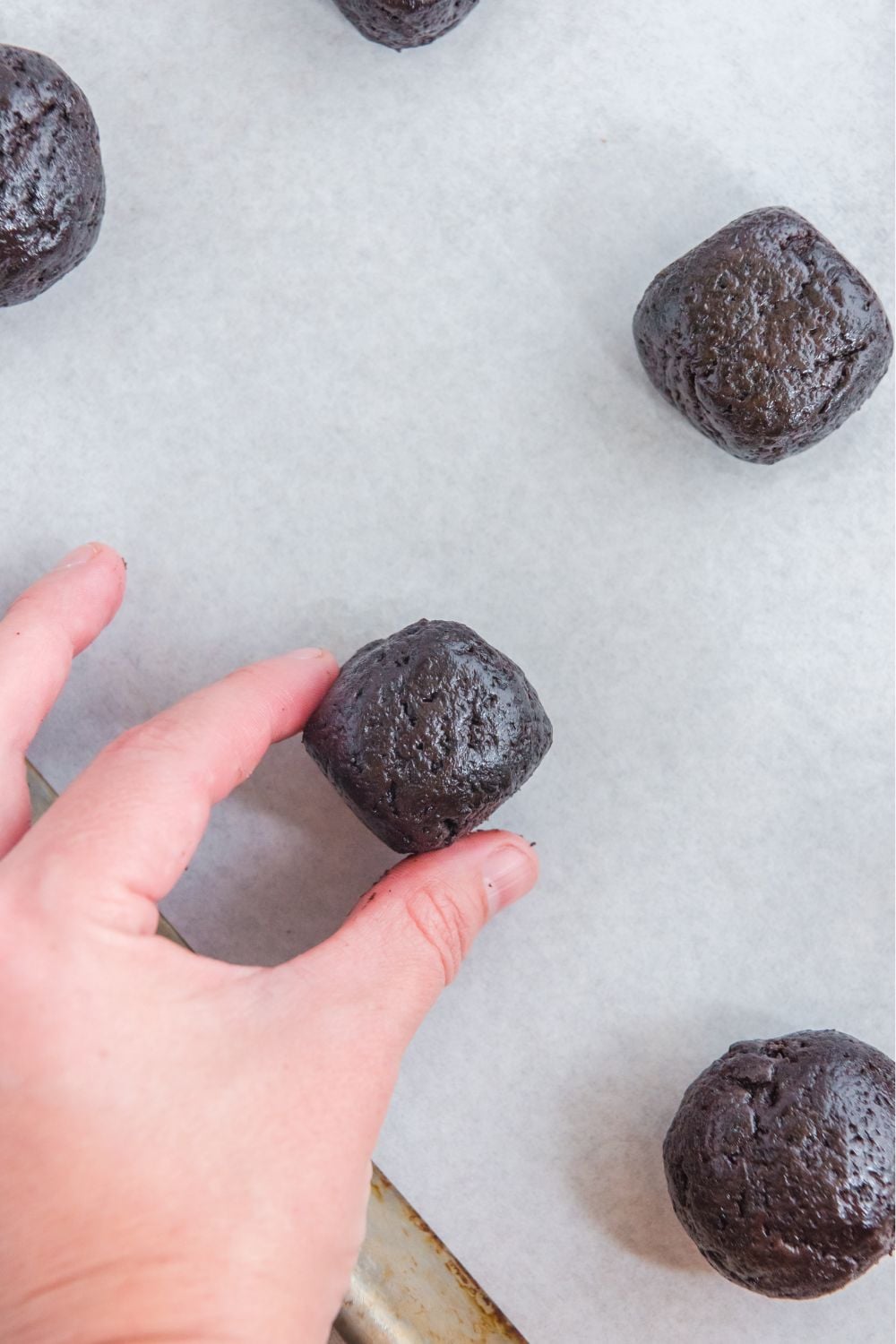 shaping a halloween truffle into a square