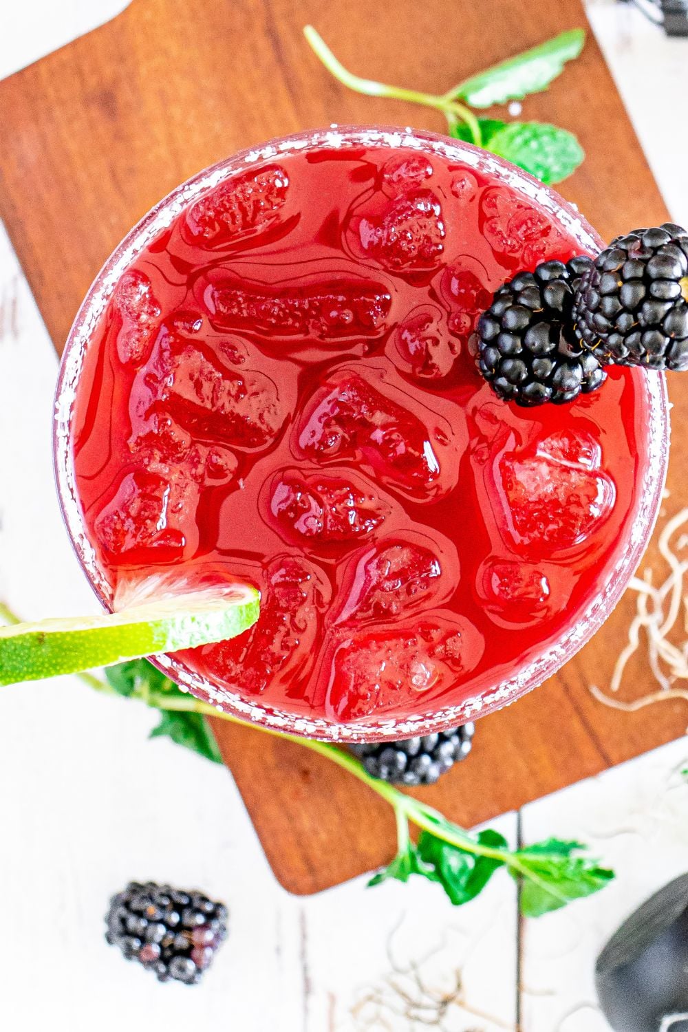 hocus pocus drink overhead shot with lime and blackberries on the side