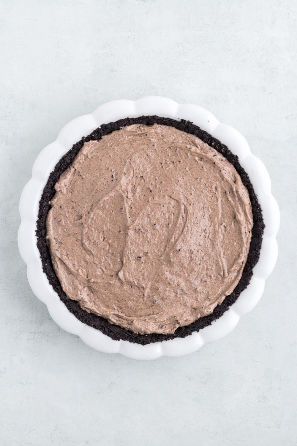 chocolate pudding pie in pan on table 