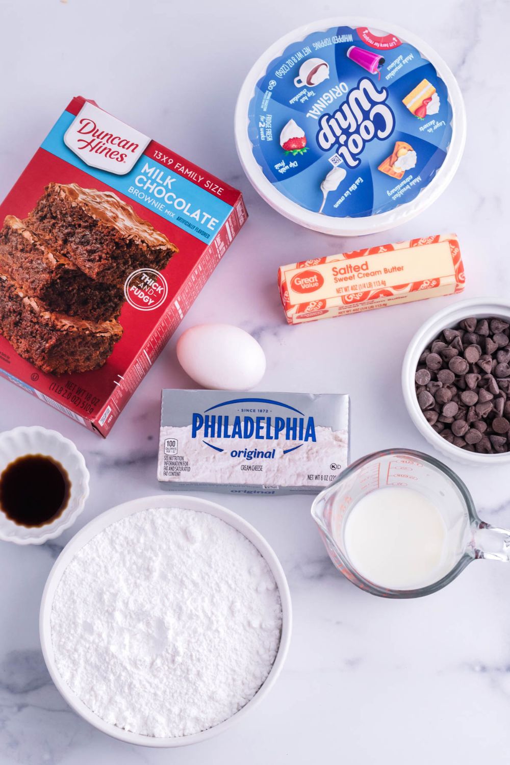Ingredients on marble counter for French silk pie brownies recipe