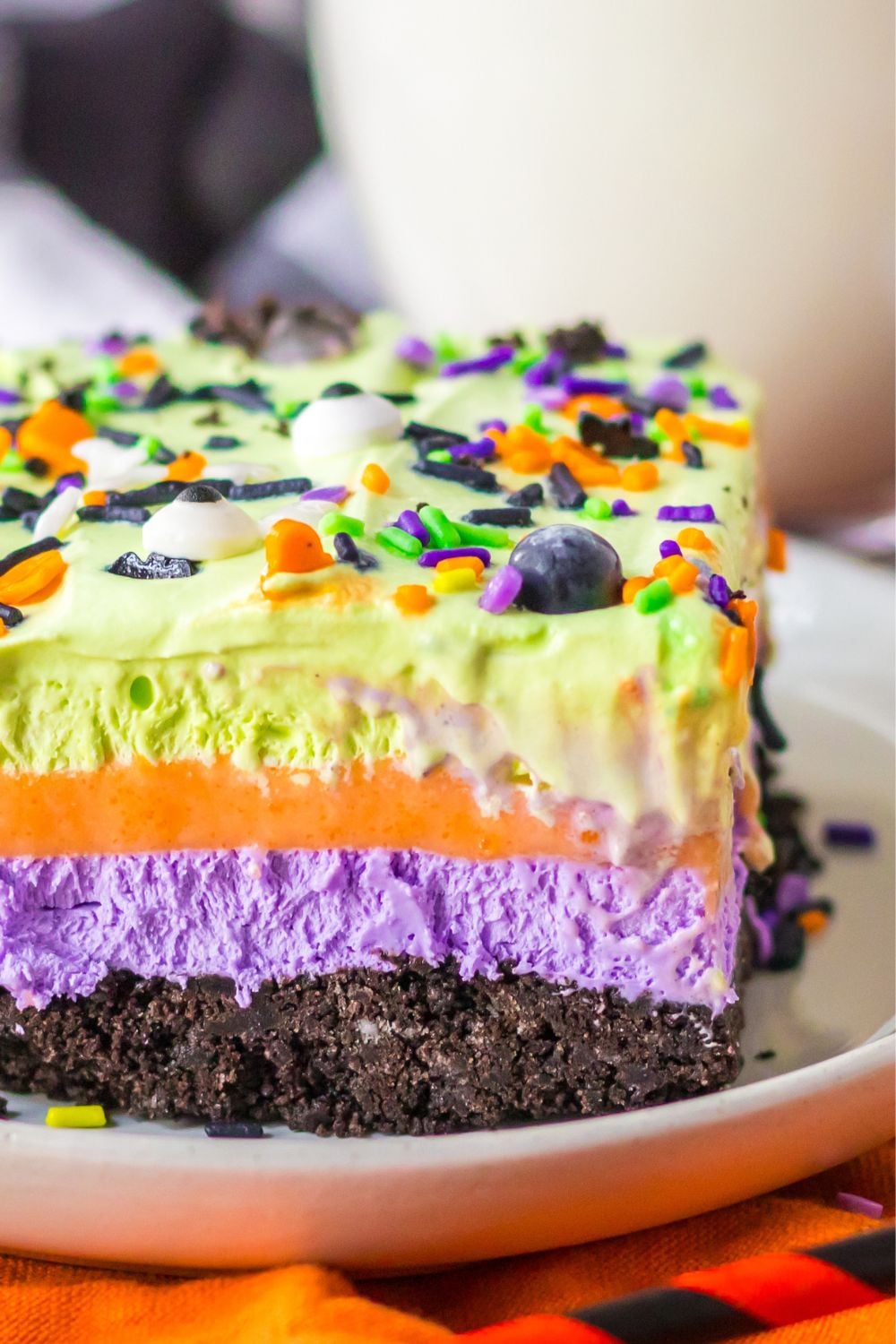 side of dessert on plate to see layers in the Halloween lush dessert