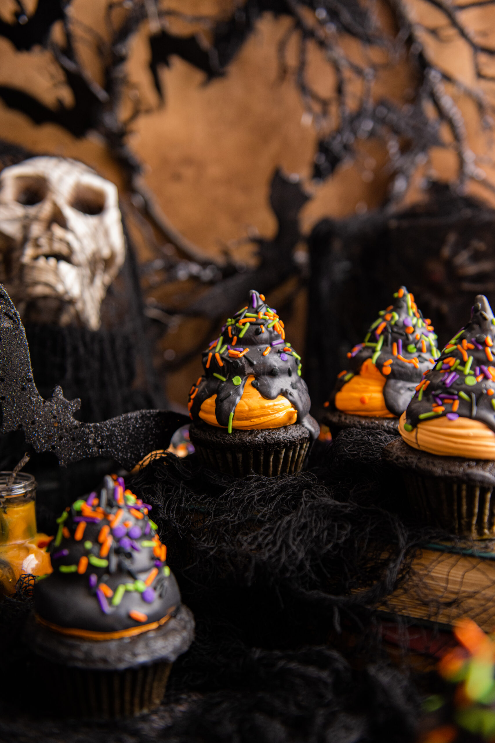 spooky black theme with halloween cupcakes