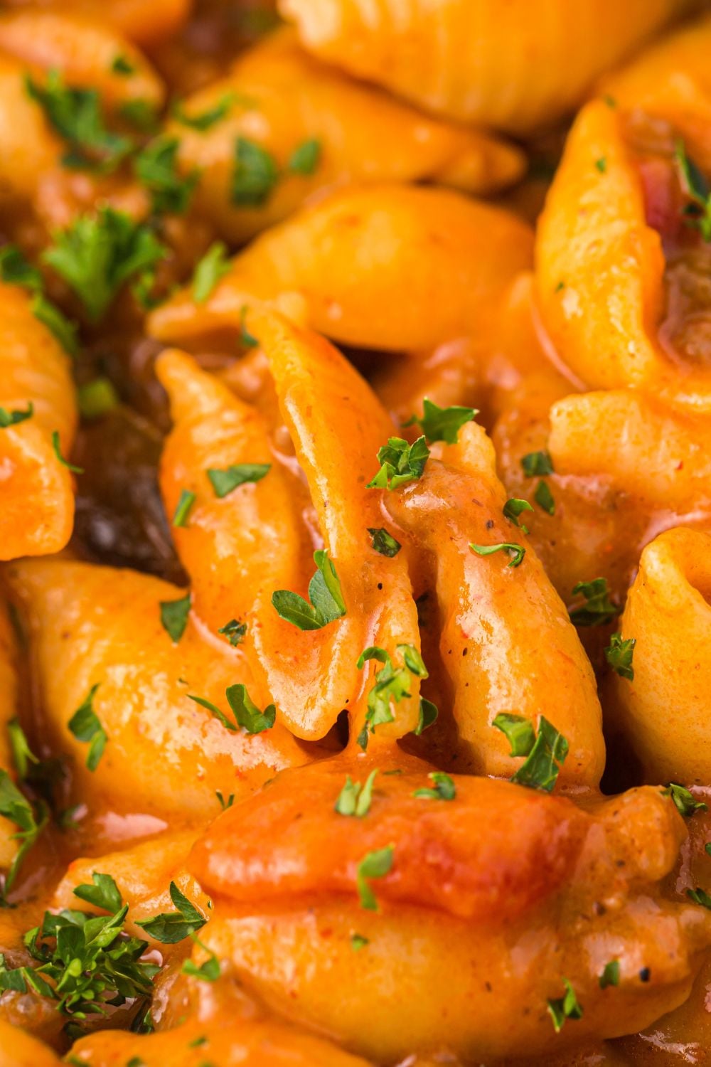 close up of cheesy pasta taco pasta in a pan 