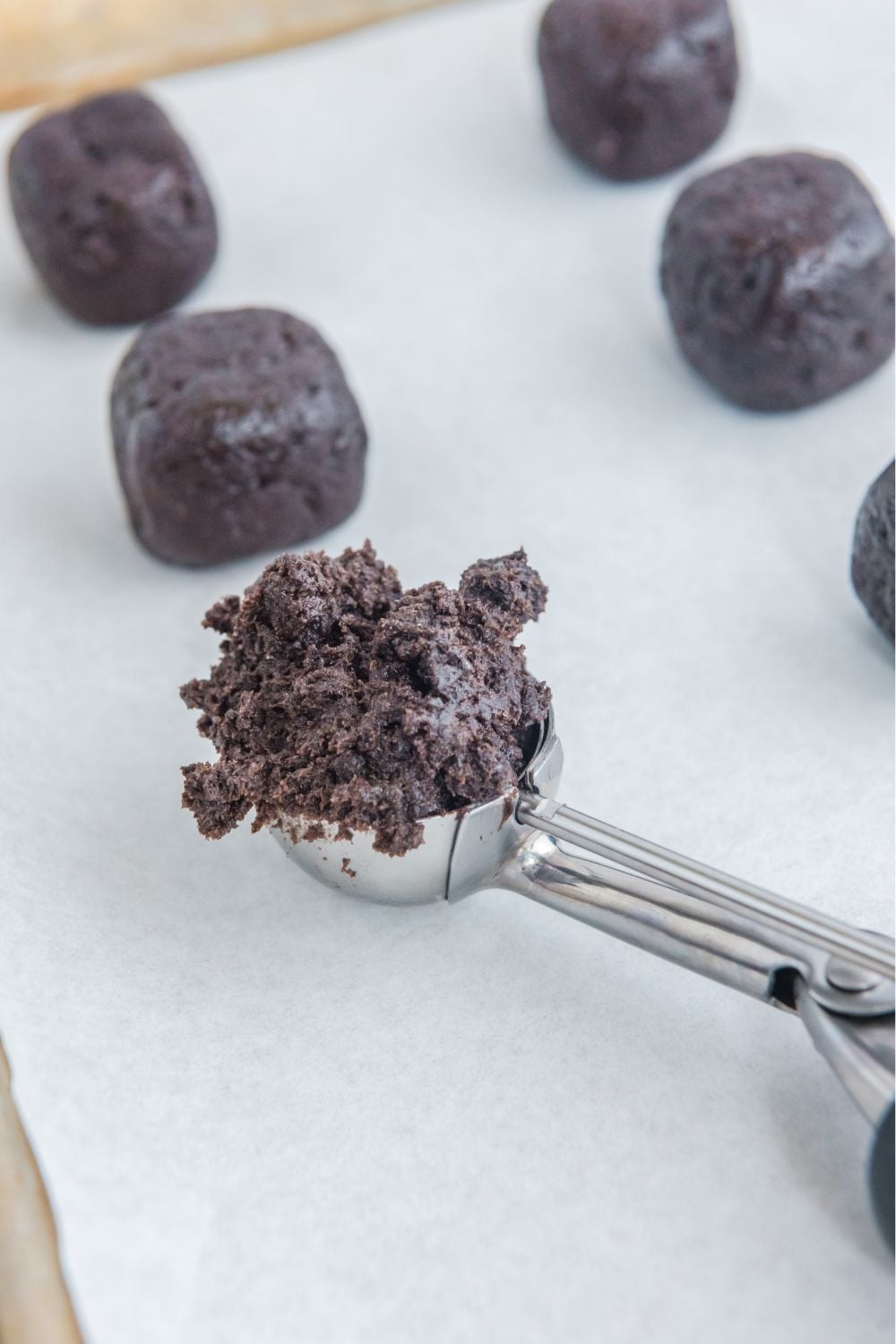 scoop of oreo truffle in a cookie scoop