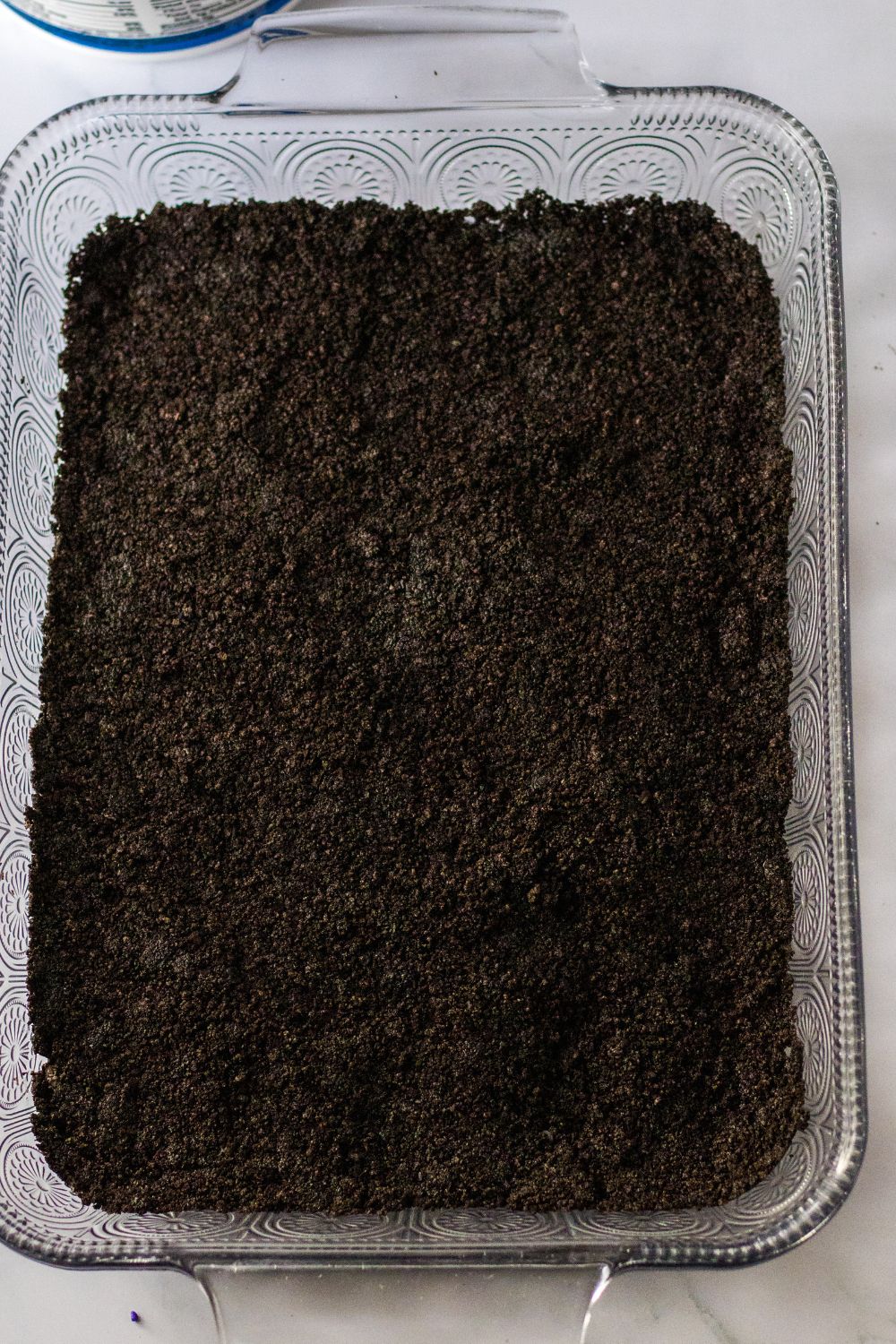 dirt crumbs spread in a baking dish