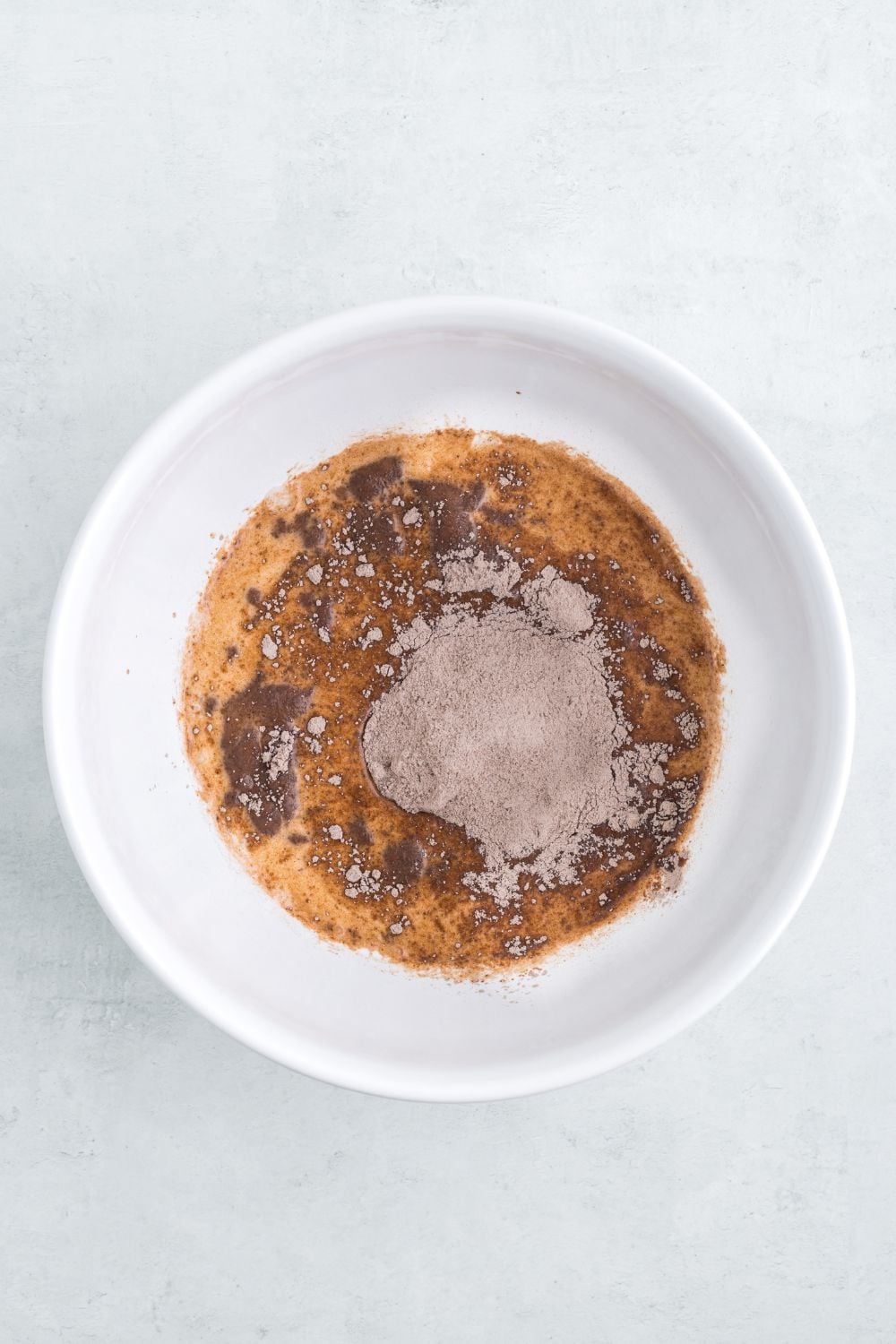 pudding and milk in a mixing bowl 