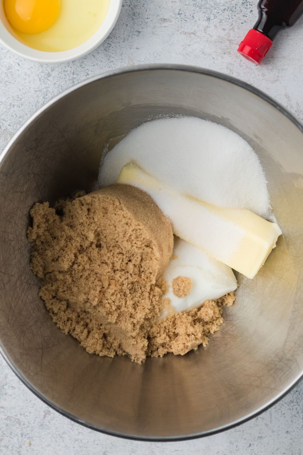 brown sugar, granulated sugar, and butter in a mixing bowl