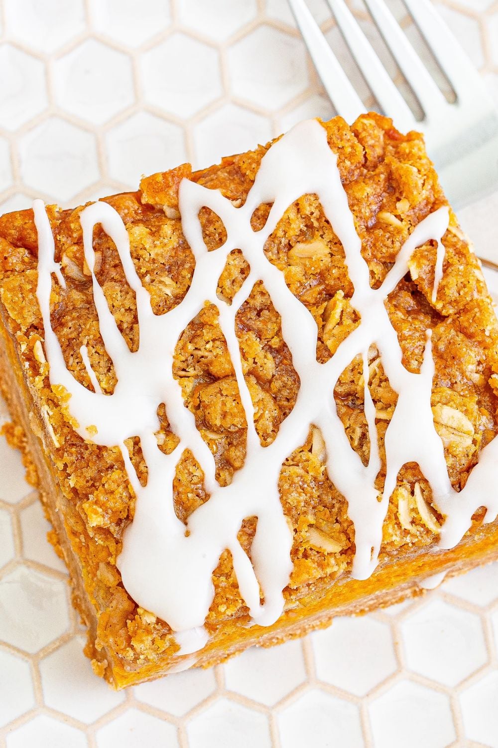 pumpkin crumble bar on plate with fork