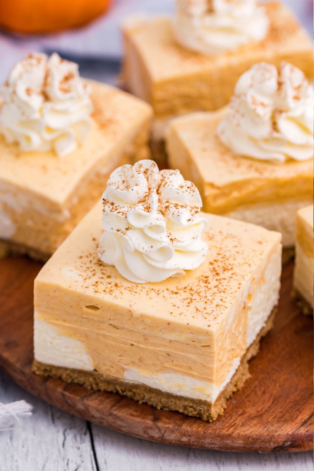 sliced cheesecake bars on table
