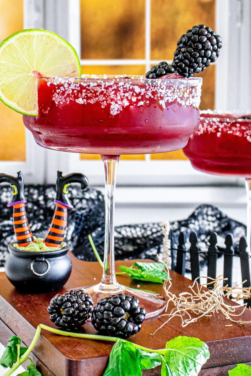 side view of margaritas in a glass on table