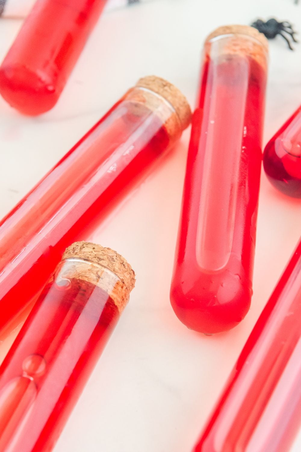 test tube drinks spread out on table
