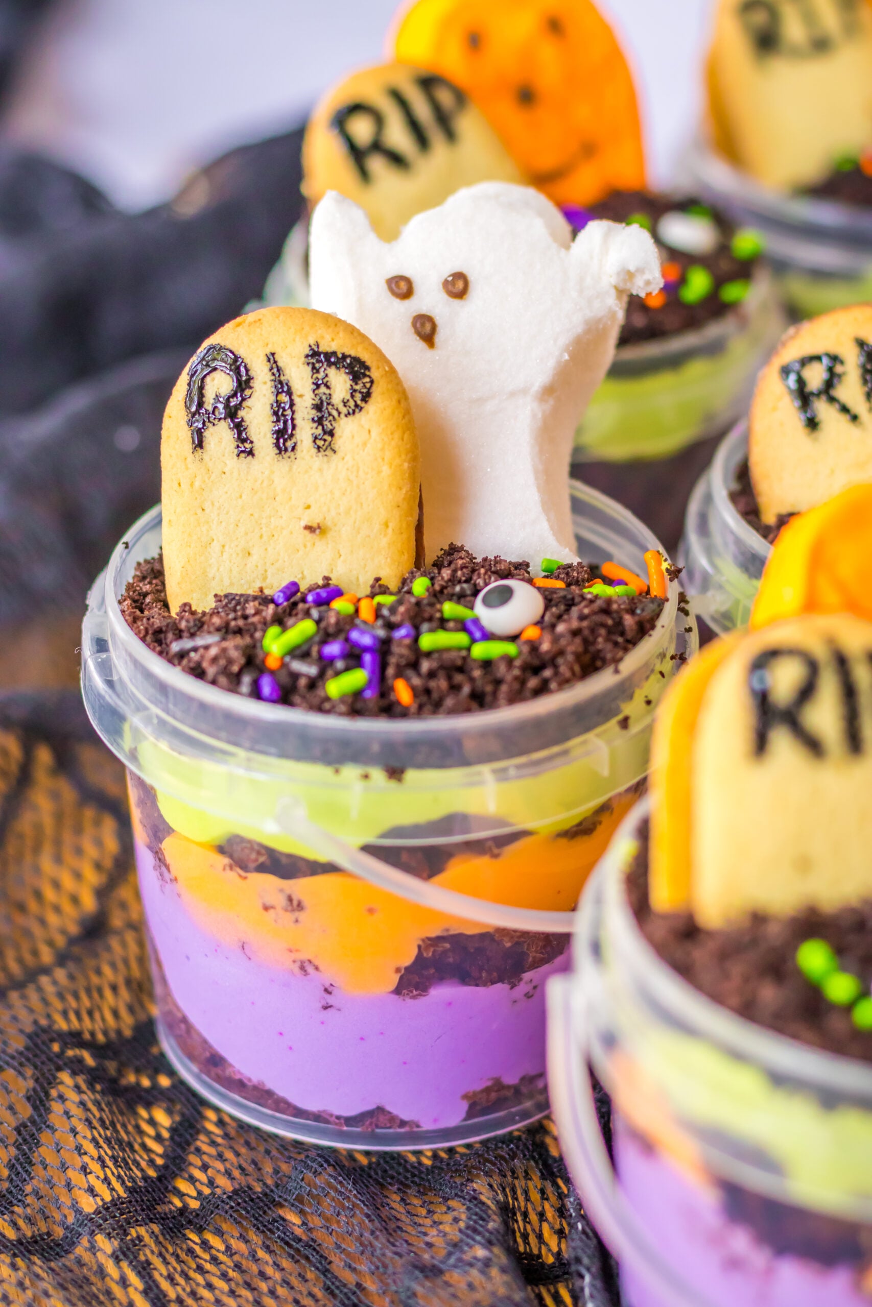 close up of dirt cake halloween dessert in a bucket