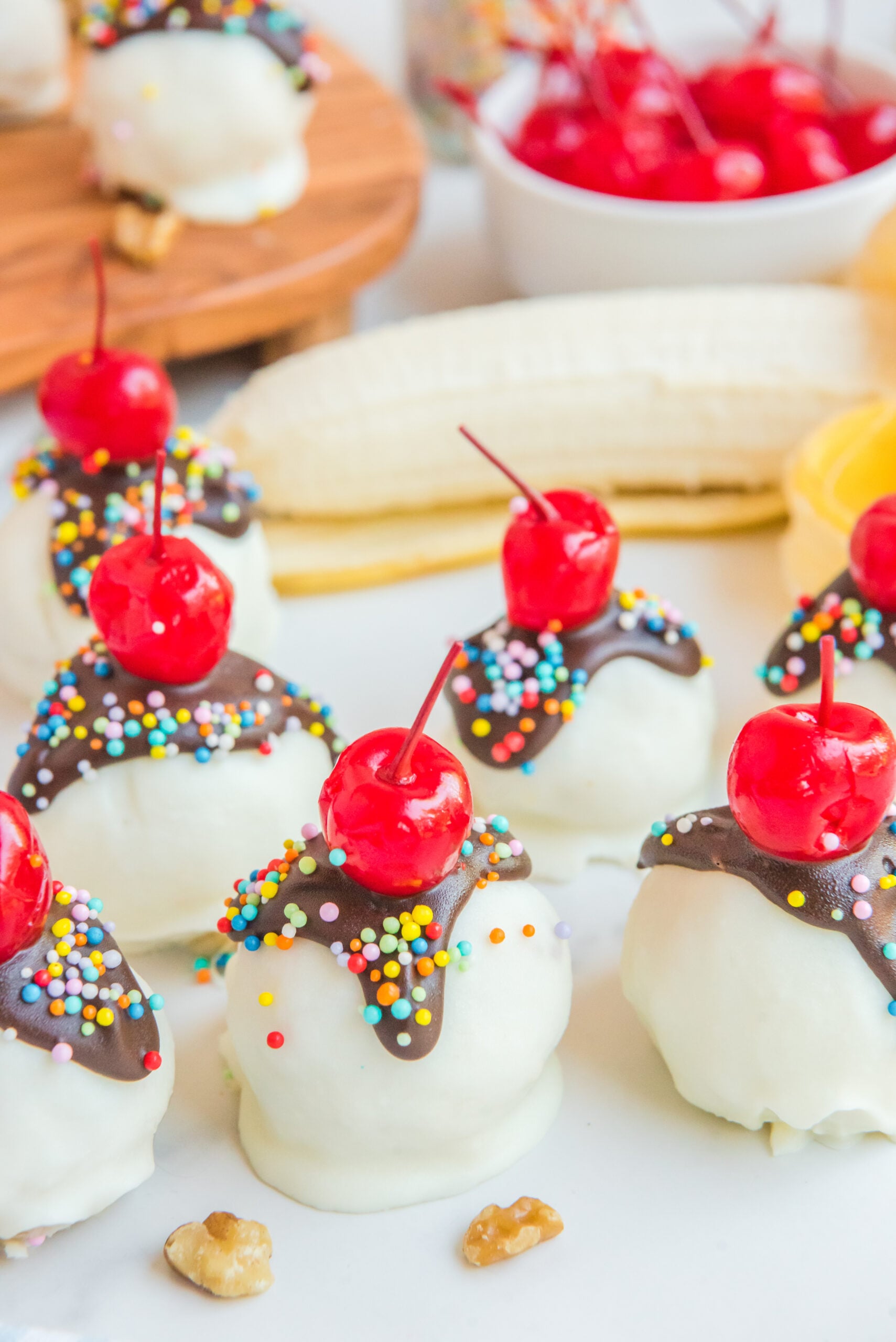 Front view of Banana Truffles surrounded by nuts.