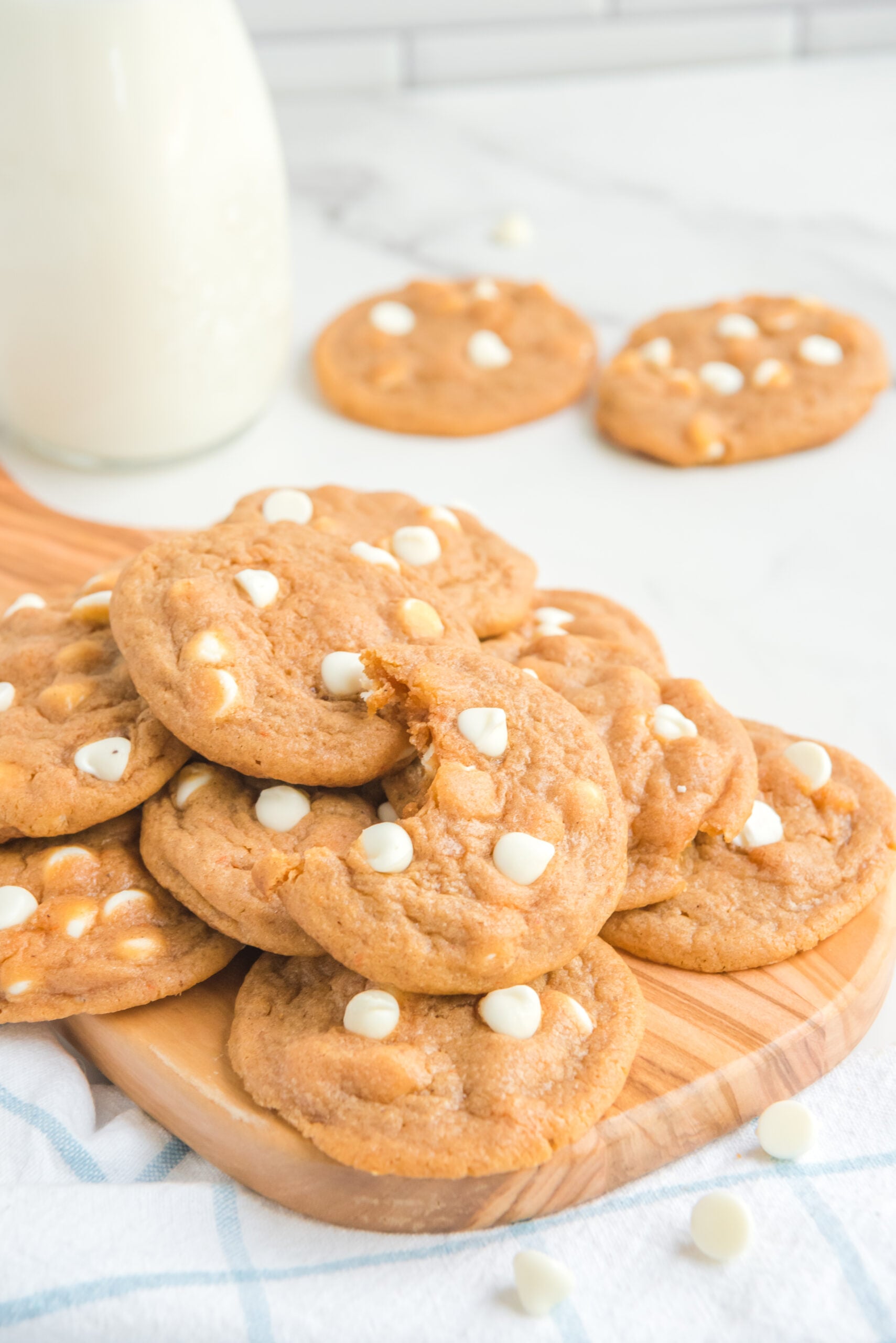 Pumpkin Spice Pudding Cookies on a wooden cutting board