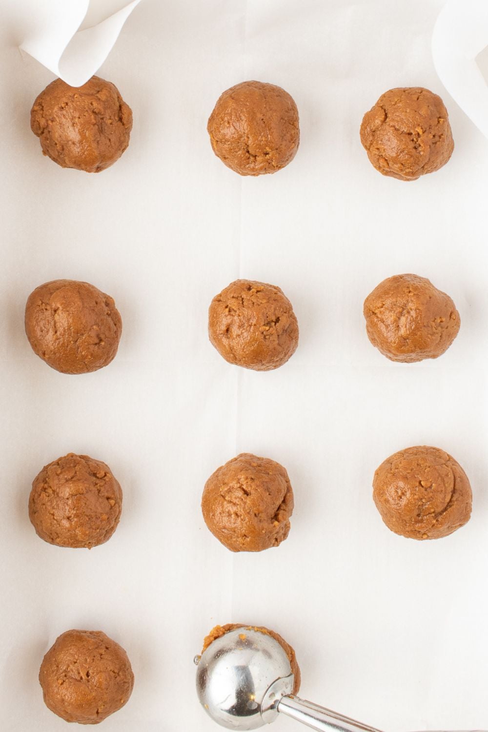 Biscoff Truffle balls on a baking sheet