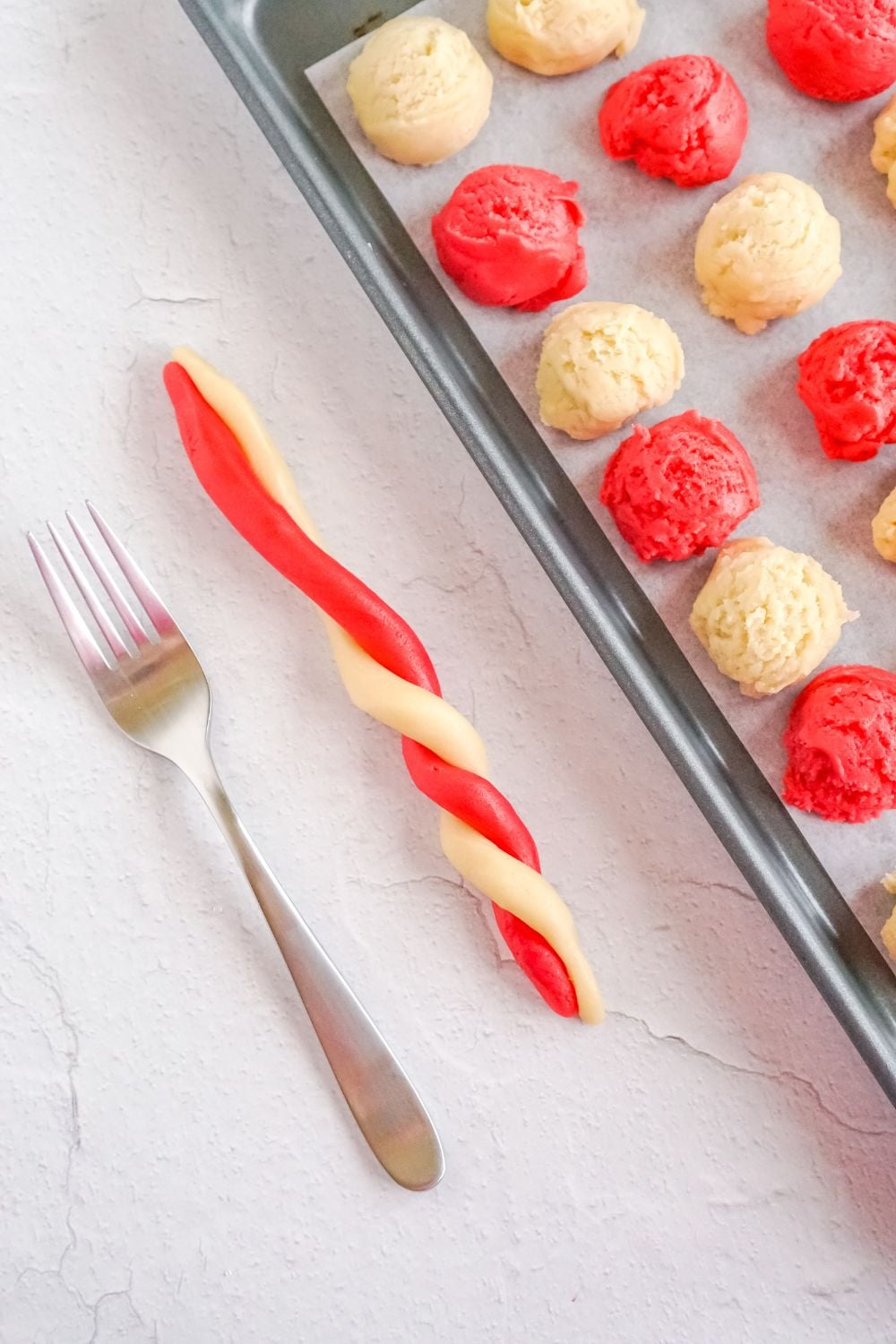 twisting cookie dough on table