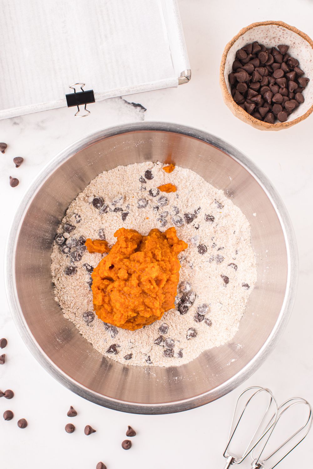 cookie batter mixed with pumpkin puree on top