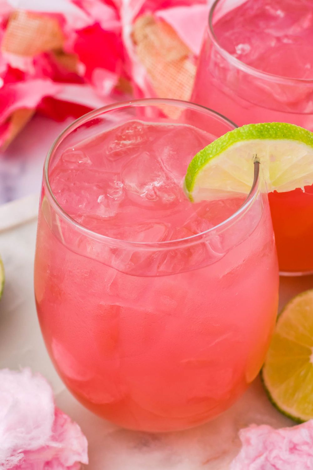 cotton candy margaritas in glasses on table