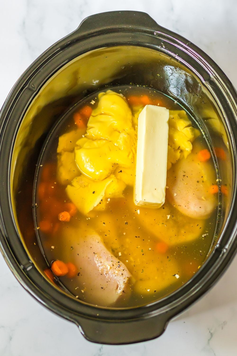 crockpot chicken noodle soup in a crockpot