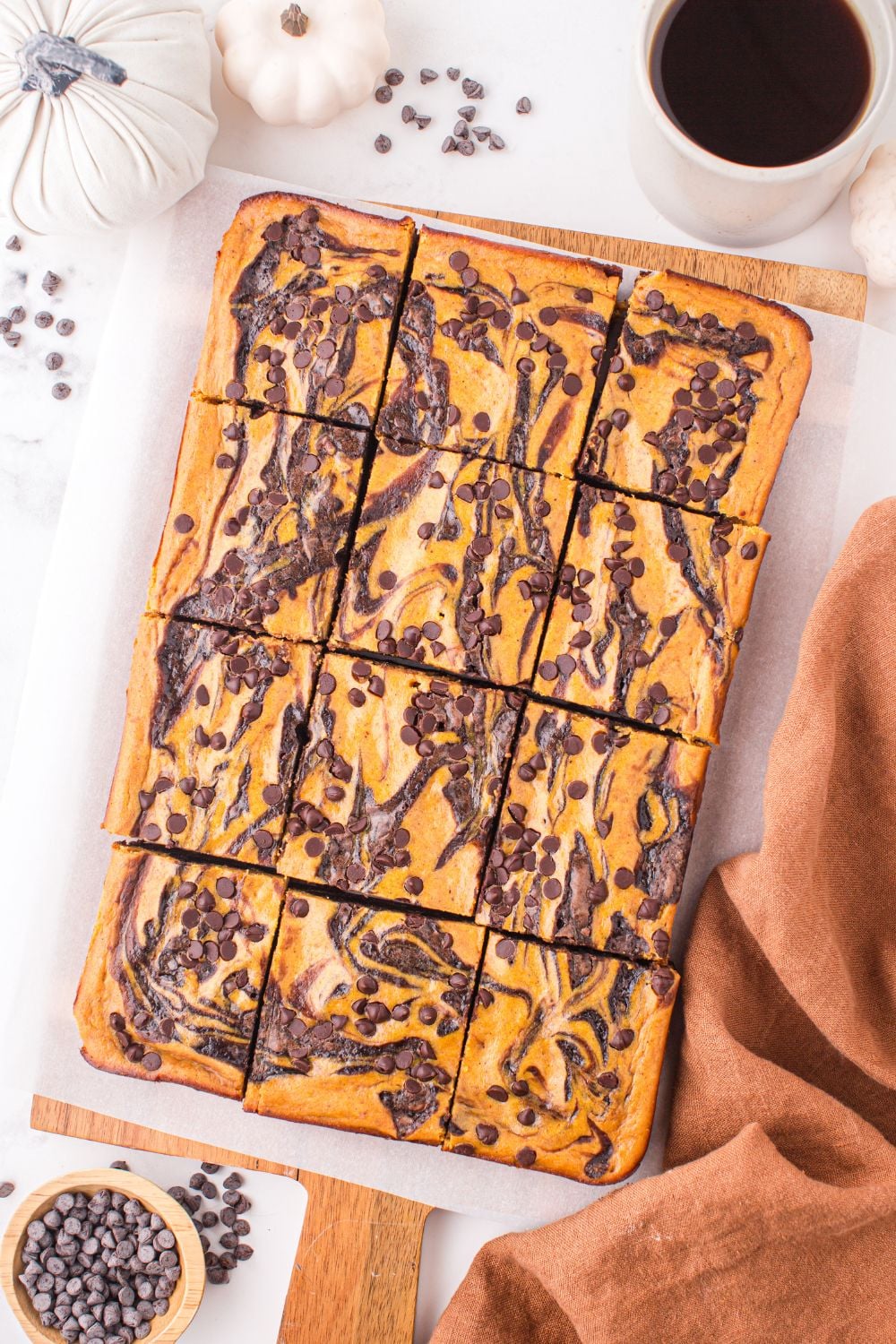 overhead shot of pumpkin brownies sliced on counter