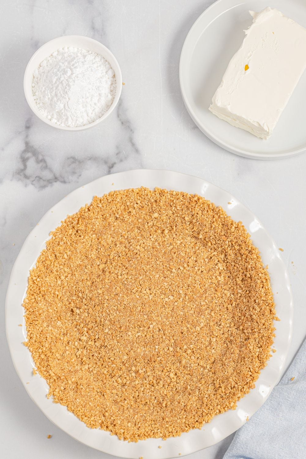graham cracker crust in a pie pan
