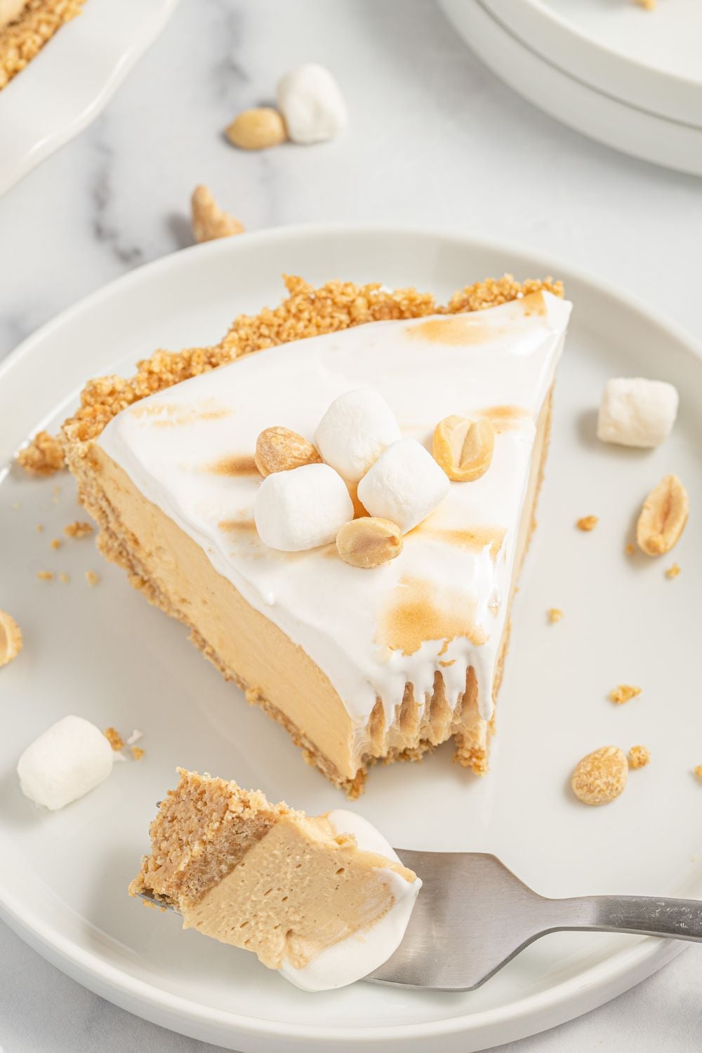 fluffy pie on plate with a bite taken out of the slice