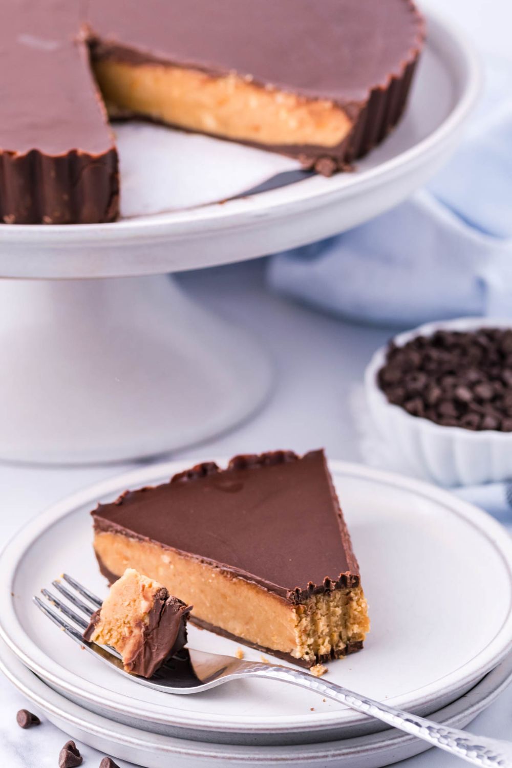 giant peanut butter cup pie slice on table