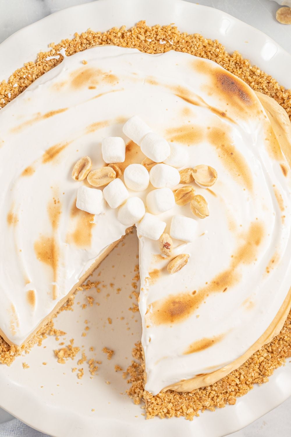 fluffernutter pie on platter with a slice taken out