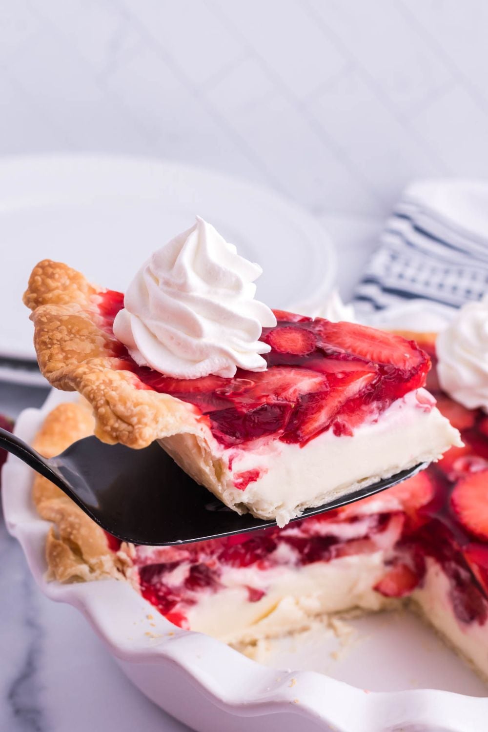 slice of pie above the pie pan